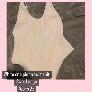 Kyria White one piece swimsuit size L, worn 2x, in great condition.